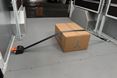06_Strap and tensioner for securing cargo in a van